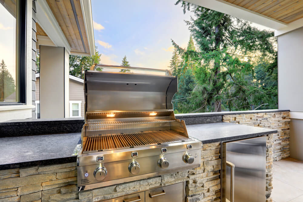 Closeup View of Opened Barbecue Grill at Outdoor Patio