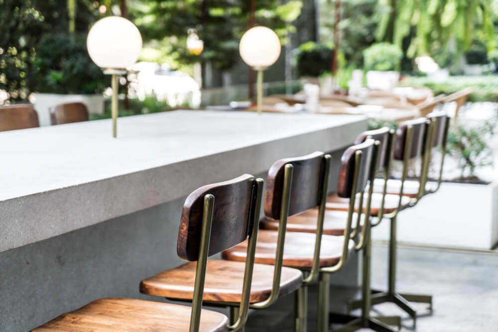 Empty Chair on Outdoor Bar in Restaurant or Coffee Shop Cafe