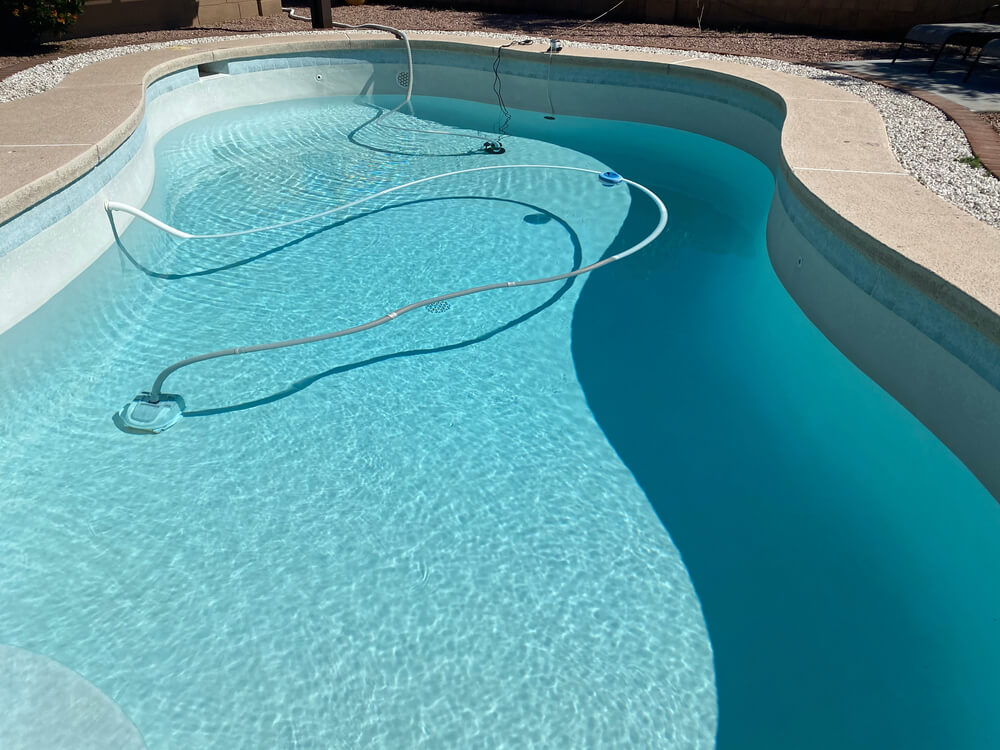 Swimming Pool Being Drained for Repair